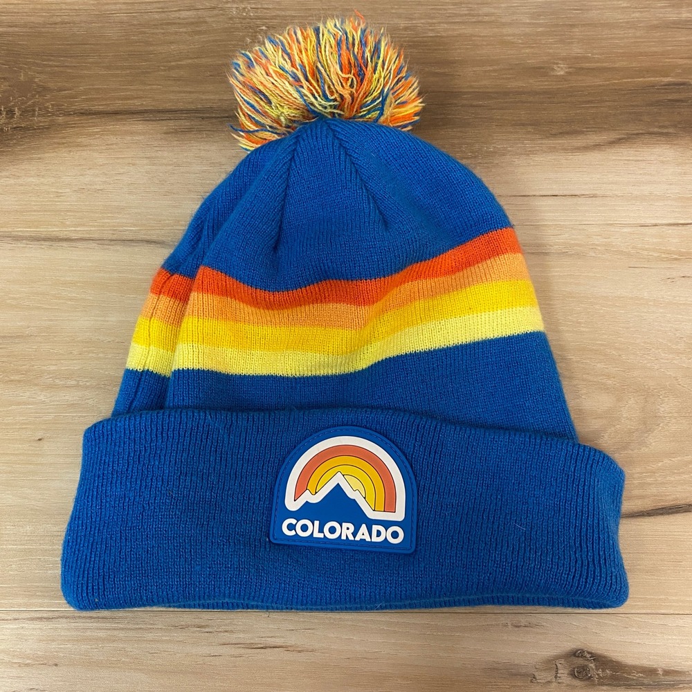 Colorado Rainbow Striped Beanie Pom Hat Blue Acrylic Rainbow Logo